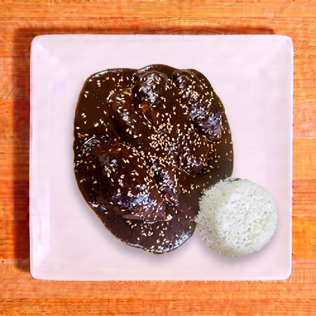 Pollo Mole Poblano (Chicken in Mole Poblano).